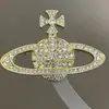 Exquisito Broche de Saturno con Pedrería de Aleación, Lujo Accesible, Gama Alta, Corsage de Diseño Personalizado, Joyería Elegante de Moda y Versátil para Mujeres