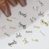 Nova Joia para Unhas com Laço de Liga Internet Celebridade Estilo Quente Dourado e Prateado Pequeno Laço de Gravata Versátil Acessórios de Diamante para Unhas de Natal