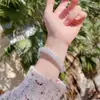 Pulsera Estilo Palacio Guochao para Mujer Pulsera de Cobre Blanco Chapada en Plata Moneda Hueca Tallada Fu Lu Shou Pulsera de Madre