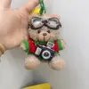 Colgante de Peluche Oso Cámara Creativo Muñeco de Dibujos Animados Muñeco Piloto Regalo de Pareja Llavero Adornos para Colgar en Bolsos