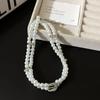 Gargantilla europea y americana de doble capa con hebilla de cinturón de diamantes y perlas, collar de cadena de clavícula con temperamento de diseño de nicho de lujo ligero para mujer