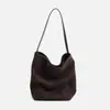 Diseño de nicho bolso de diario otoño e invierno nuevo bolso cubo bolso de hombro para mujer gran capacidad costuras de cuero bolso de axila para mujer