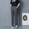 Pantalones de traje versátiles y elegantes para negocios casual para hombre, con una caída de alta gama, pantalones de primavera transpirables de corte cropped, modernos