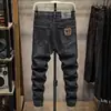 Jeans negros elásticos de primavera para hombre, marca de moda, nuevos pantalones ajustados skinny para primavera y otoño 2006, pantalones largos finos de verano