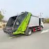 Caminhão Compactador de Lixo Sinotruk Howo de 6 Metros Cúbicos Coleta e Transporta Lixo Doméstico na Comunidade com uma Rede Completa de Pontos de Venda de Pós-Venda
