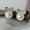 Aguja de Plata S925 Perla de Agua Dulce Estrella de Arco Joker Celebridad de Internet Misma Fuente Fábrica Directa Pendientes y Orejas de Perla