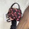 Moda Nova Primavera 2026 High-End Estampa de Cereja Versátil Simples Estiloso Bolsa de Ombro Cruzada Bolsa Concha
