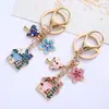 Accesorios de Joyería DIY Estilo K Casa Flor Habitación Llavero de Metal Llavero de Flor Pequeña Linda Colorida Colgante para Bolsos
