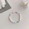 Pulseira Floral de Verão Fresca e Doce Atacado, Estilo Pastoral, Pulseira de Flor de Pérola Transparente e Versátil com Folhagem para Mulheres
