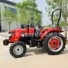 O trator Luoyang Wannianhong 504 é equipado com um cultivador rotativo e um arado de discos, um trator agrícola multifuncional adequado tanto para terra úmida quanto seca
