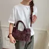 Bolso Retro de Gamuza para Mujer 2026 Nuevo Bolso de Mano Coreano de Moda Remache Motocicleta Bolso Tote de Gran Capacidad de Gama Alta