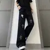 Jeans negros rotos y adornados con pedrería, con estampado de cruces para hombre, de pierna recta modernos, ligeramente acampanados, largos, rotos y adornados con pedrería