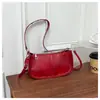 Bolso de mano brillante con brillo metálico para mujer 2026 verano nuevo celebridad de internet de moda bolso de axila de un solo hombro bolso cruzado de moda