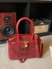 Bolso Súper Popular de Comercio Exterior con Forma de Concha Nuevo Modelo 2026 Versátil Bolso Cruzado de Cuadros Bolso de Hombro de Nicho de Alto Valor Estilo Americano