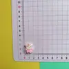 Dibujos animados de hielo a través de una pequeña flor durmiendo bebé gato conejo cachorro DIY accesorios de resina funda de teléfono móvil horquilla hebilla de zapato pegatina