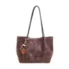 Bolsa Grande Estampa de Leopardo Feminina Nova Outono 2026 Retro Simples de Ombro e Mão Versátil Bolsa Tote para o Dia a Dia