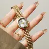 Reloj Cuadrado Pequeño Retro NAIDU Reloj de Cuarzo para Mujer Moda Simple Correa de Metal Acero Versátil para Viajes de Negocios Nicho Lujo Ligero Muñeca