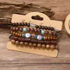 Amazon venta caliente transfronteriza pulsera de cuentas hecha a mano estilo retro para hombre pulsera de línea elástica multicapa con cuentas de madera árbol de la vida