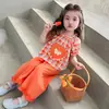 Conjunto Feminino 2026 Novo Estilo Coreano Moda Infantil Menininha Aplique Laço Xadrez Conjunto de Duas Peças para Bebês e Crianças Pequenas