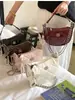Bolso estilo Chanel de estrella y luna para mujer, nuevo modelo 2026, bolso de axila de nicho de lujo ligero, bolso de cadena acolchado, bolso de mano y bolso cruzado
