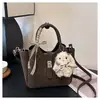 Bolso Cubo Retro de Gama Alta de Nicho Transfronterizo para Mujer 2025 Nuevo de Moda Popular Bolso Cruzado Versátil Bolso de Viaje