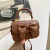 Bolso Cuadrado Pequeño de Mano Moderno y Sencillo Bolso de Lazo de Nicho para Mujer Nuevo Llegado Otoño 2026 Bolso Cruzado de Textura Moderna y Elegante
