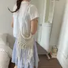 2026 Nuevo Bolso de Mano Tejido con Borlas de Gran Capacidad Retro, Bolso de Playa Calado, Bolso Cruzado Casual Elegante de Nicho