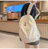 Mochila de gran capacidad para mujer para estudiantes de secundaria y universidad, mochila casual deportiva transfronteriza simple, mochila de viaje, personalizable