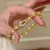 Pulseira Retro Francesa com Fivela de Ferradura para Mulheres, Pulseira Elástica de Corda Estilo Antigo de Nicho para Mulheres
