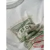 Recomendação PrincipalColeção Nova Yuran 26 Início da Primavera: Camisa Longa Oversized com Estampa de Selo Vintage em Tecido de Algodão e Linho de Algodão