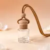 Botella de Vidrio Transparente Colgante Difusor de Aroma para Coche Cuerda Marrón de Cintura Alta Botella Redonda Plana 10ml Botella Vacía Botella Difusora de Aroma para Coche