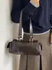 Bolso Femenino de Moda Nuevo Bolso Cilíndrico Versátil de Hombro Único Otoño 2026 Nuevo Bolso de Mano Simple y Elegante para Dama