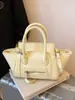 Bolso de Hombro Versátil de Moda Retro para Mujer, Nuevo Bolso de Invierno con Cara Sonriente con un Toque de Lujo, Bolso de Mano y Bolso Cruzado de Lujo Ligero