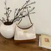 Bolsa de ombro com corrente para mulheres, nova moda primavera 2026, bolsa de ombro única retrô da moda, bolsa transversal para o dia a dia