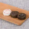 Venta al por mayor de té de Yunnan té Pu'er té cocido fragancia glutinosa té Tuo xiaotuo cocido pupu 500g Tuo mini