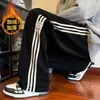 Pantalones para Hombre Otoño e Invierno con forro polar Engrosados Estilo Americano Marca de Moda High Street Sueltos Pierna Ancha Rectos Modernos Casuales Deportivos