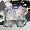Conjunto de Verano para Niños 2026 Nuevo Elegante Bebé Manga Corta Pantalones Cortos de Mezclilla Niños Verano Estilo Coreano Conjunto de Dos Piezas Moderno
