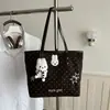 Bolso de mano lindo de lunares de gran capacidad para mujer, versión coreana, bolso tote de nicho para el día a día, bolso de hombro casual de moda para el trabajo