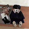 Ropa Infantil Coreana Estilo Preppy Conjunto de Punto Otoño 2025 Nuevo Estilo Suéter con Cuello Polo Shorts para Niños y Niñas Tendencia