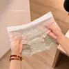 Ropa Interior de Malla para Mujer Estilo Femenino de Alto Valor 2026 Nuevos Calzones Triángulo Diseño Sutil Estilo Ascético Verano Delgado Sexy