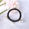 Versión coreana de los fabricantes mayoristas de anillos para el pelo de perlas de tamaño de uña de la Puerta Este versión coreana del tocado accesorios para el cabello anillo de toalla engrosado banda de goma