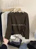 Suéter de Punto Suave Color Sólido Hueco Botón Lateral Cuello Redondo Estilo Coreano para Mujer, Nuevo Casual Holgado Manga Larga Otoño 2026