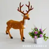 Animal de simulación ciervo sika simulación alce jirafa modelo animal de piel accesorios de decoración para cine y televisión venta al por mayor