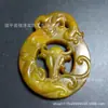 Venta al por mayor de fábrica de piezas de jade Xiu de estilo antiguo con tallado hueco, colgantes de jade con cara de animal de dragón y fénix, y adornos colgantes de jade, directo del fabricante