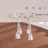 Pendientes de borla con lazo y rosca para mujer, antipérdida, con orquídeas y lirios del valle, diseño elegante y nicho.
