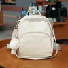 Estilo Coreano Simples 2025 Nova Bolsa Feminina Mochila de Tecido Oxford de Grande Capacidade Bolsa de Viagem Mochila Casual Multifuncional para Mulheres