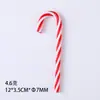 Nuevas decoraciones de bastón de caramelo de plástico rojo y blanco navideño transfronterizas son adecuadas para fiestas navideñas y arreglos de decoración del hogar.