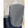 Otoño e Invierno 2025 Nuevo Chaleco Cardigan de Punto Jacquard Fair Isle Gris para Mujer, Chaleco sin Mangas Suelto para Superponer