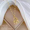 [Acero titanio] Collar elegante y lujoso con perlas de mariposa y diamantes para mujer, cadena de clavícula combinable, cadena de acero titanio.