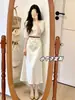 Los atuendos para mujeres petite lucen geniales: Conjunto de Top y Falda para Mujer, Nuevo Estilo Verano 2026, Impresionante y Elegante Conjunto de Dos Piezas